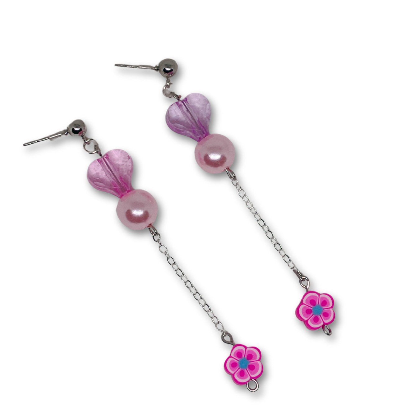 Pink dangling earrings.