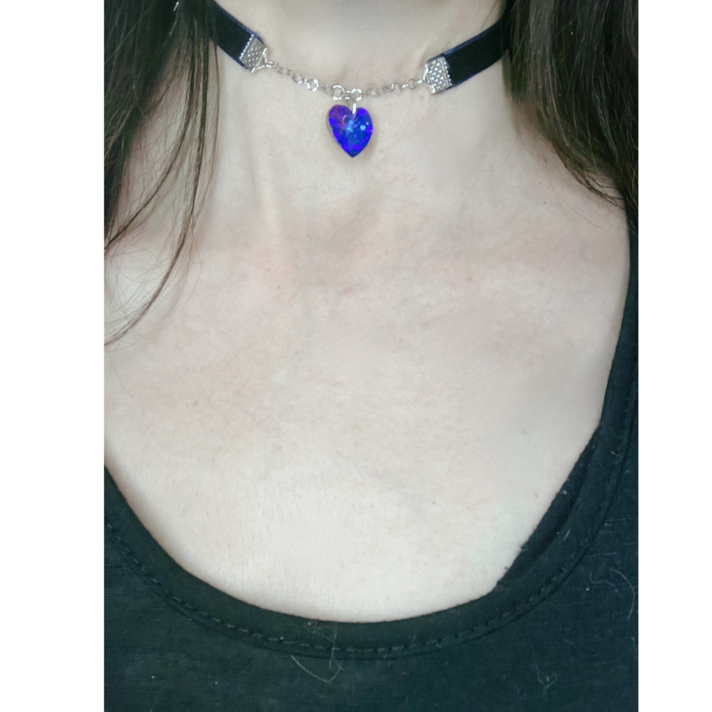 Dark blue velvet choker with chain and blue heart pendant.