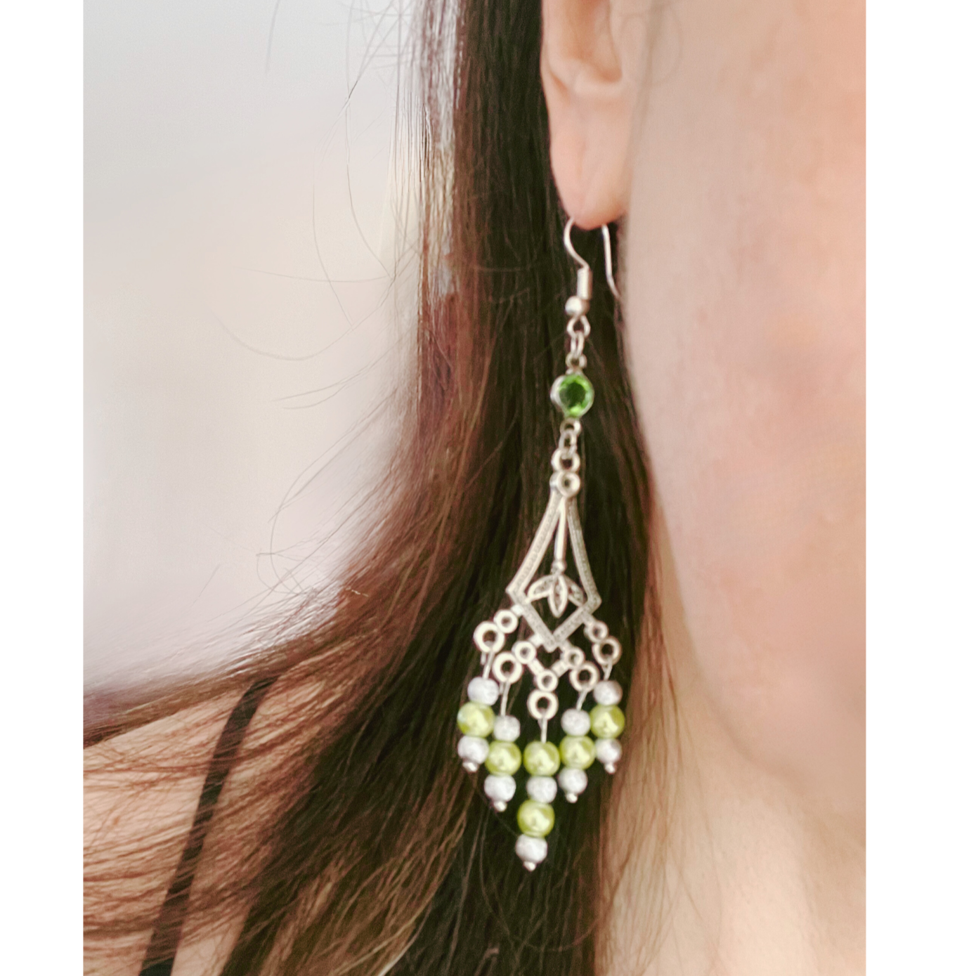Dangling green and silver earrings