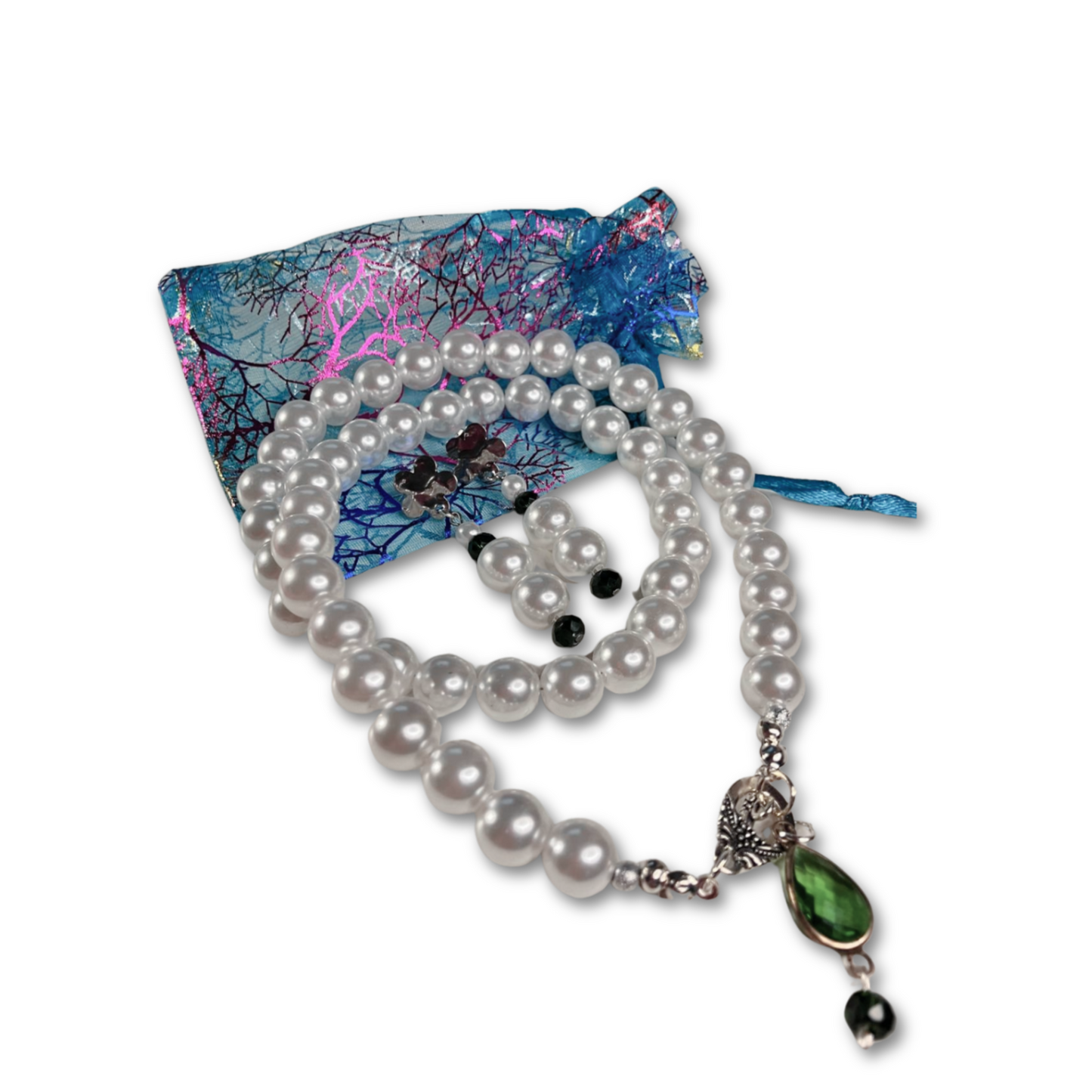 White pearl necklace with matching earrings and gift bag.