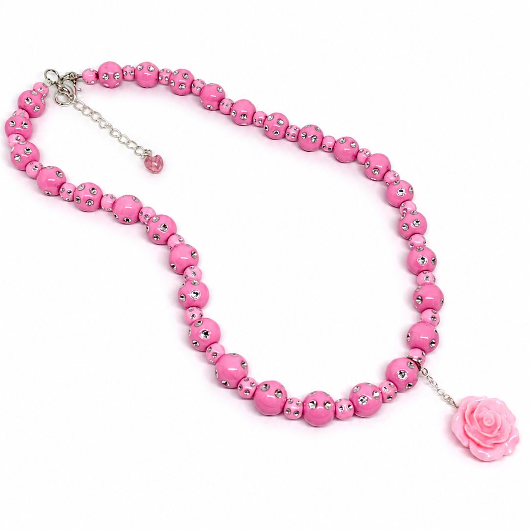 Pink beaded necklace with a rose pendant