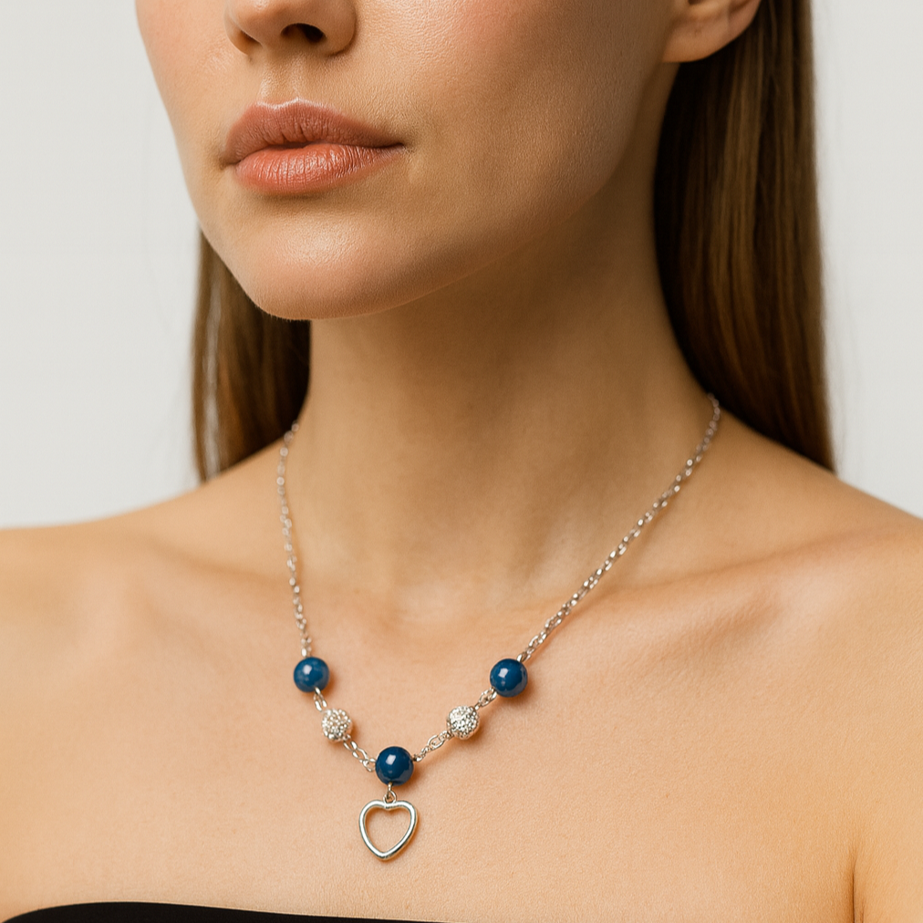Necklace with blue beads and a heart charm.