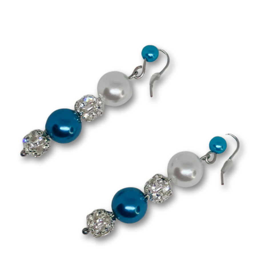 Dangling pearl earrings, white and blue pearls.