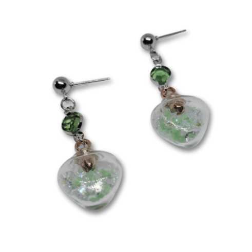 Green heart dangling earrings.