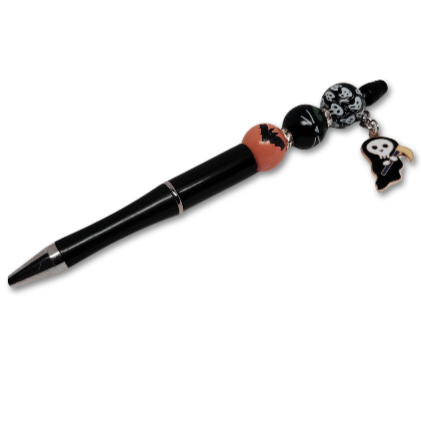 The Halloween Ghostly Glam pen adorned with a grim reaper pendant