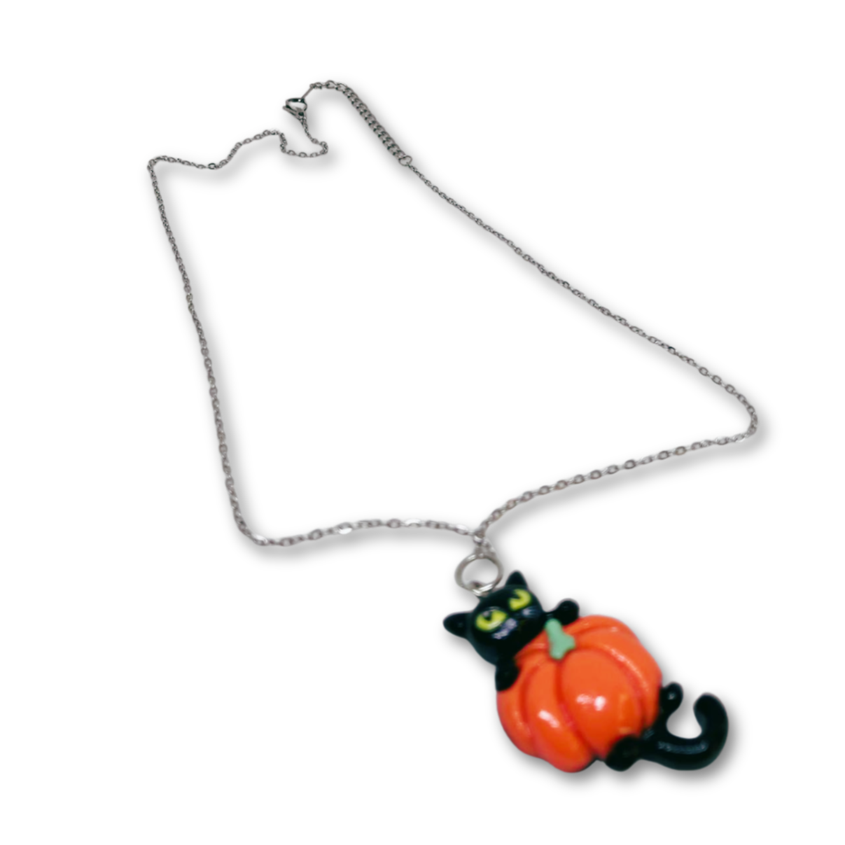 Silver necklace with black cat on pumpkin