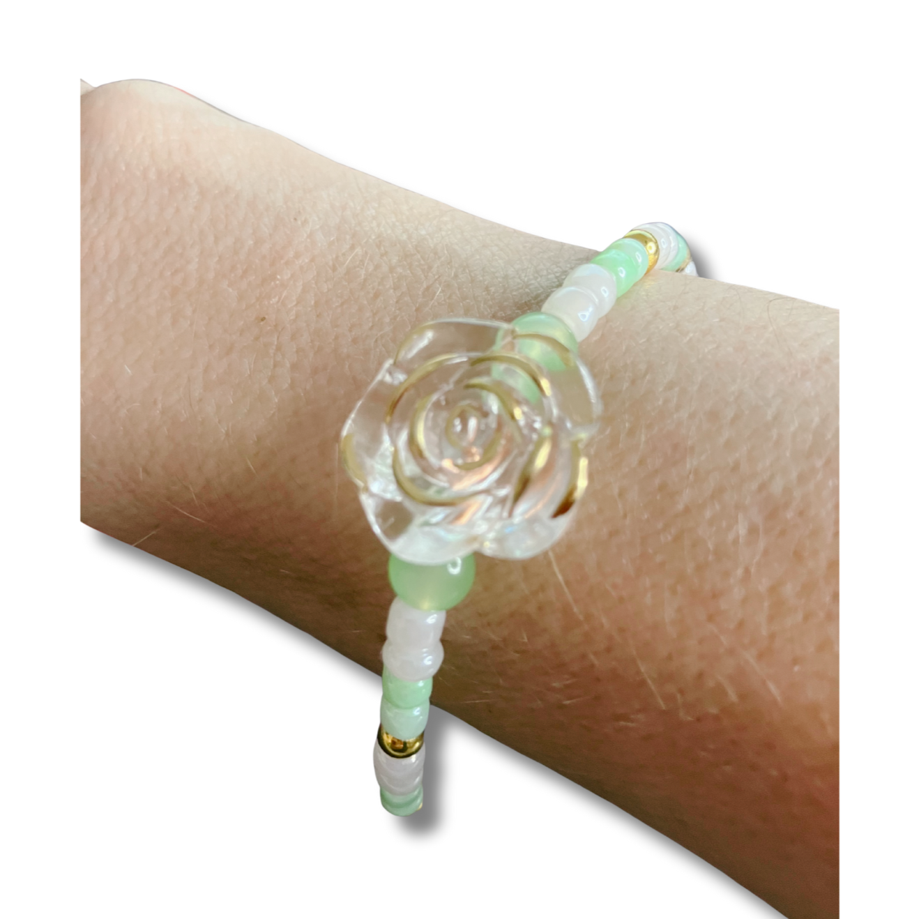 Beaded bracelet with a rose design.