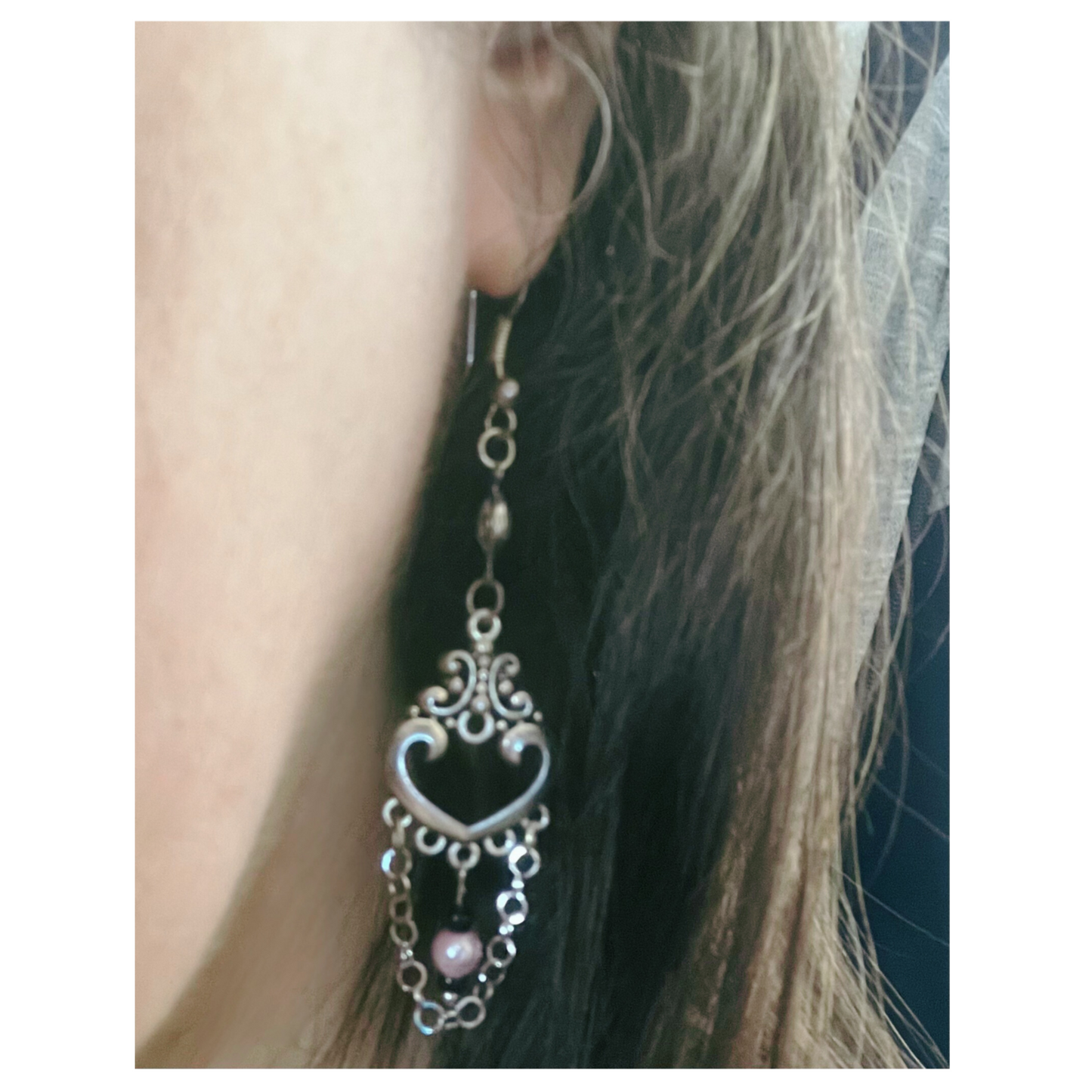 Dangling old fashion style earrings.