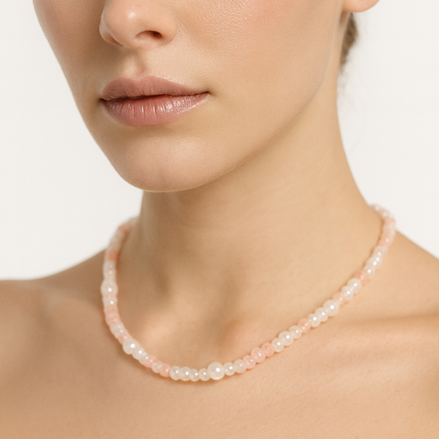 Pastel pink and white pearl necklace.