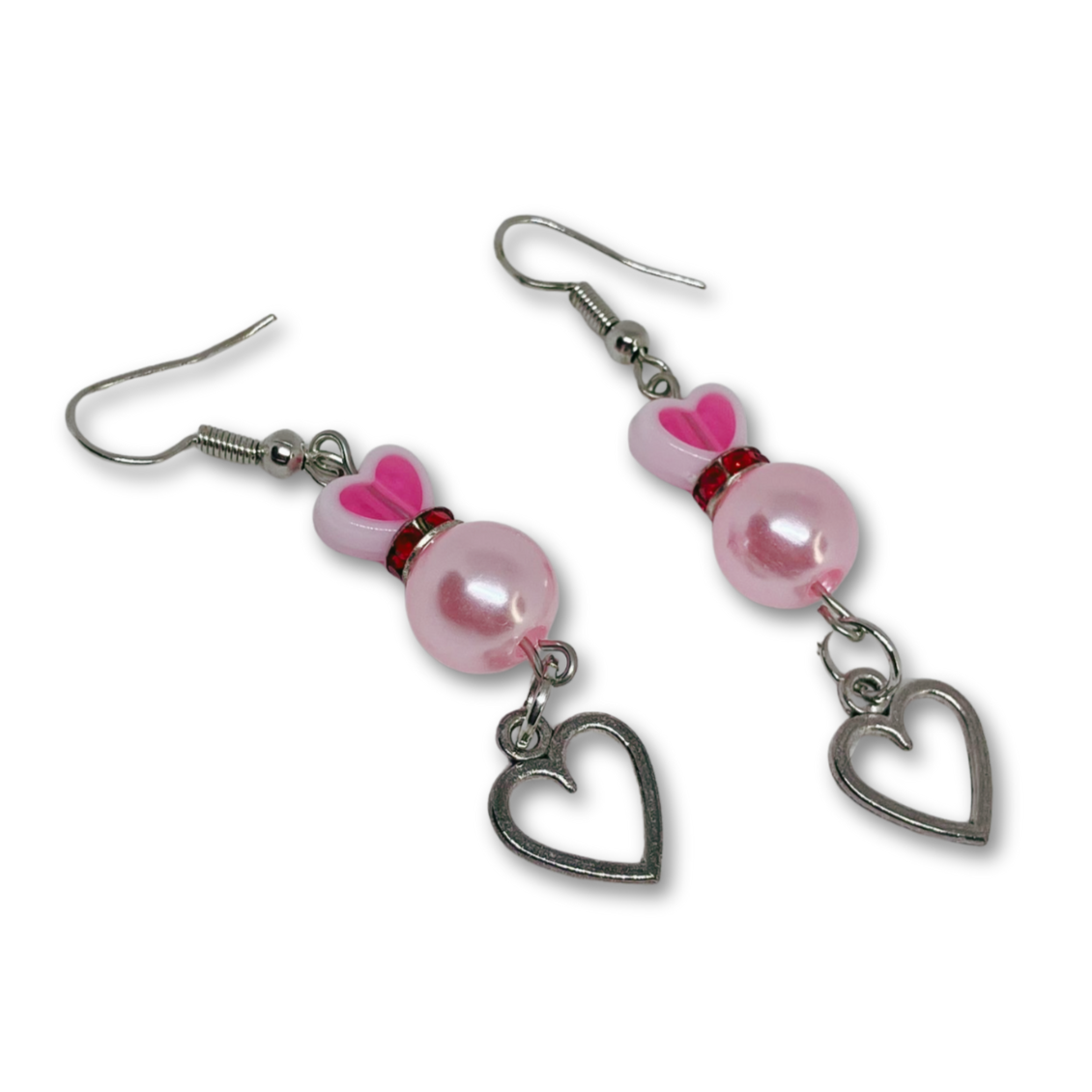 Earrings with pink beads and heart charms.
