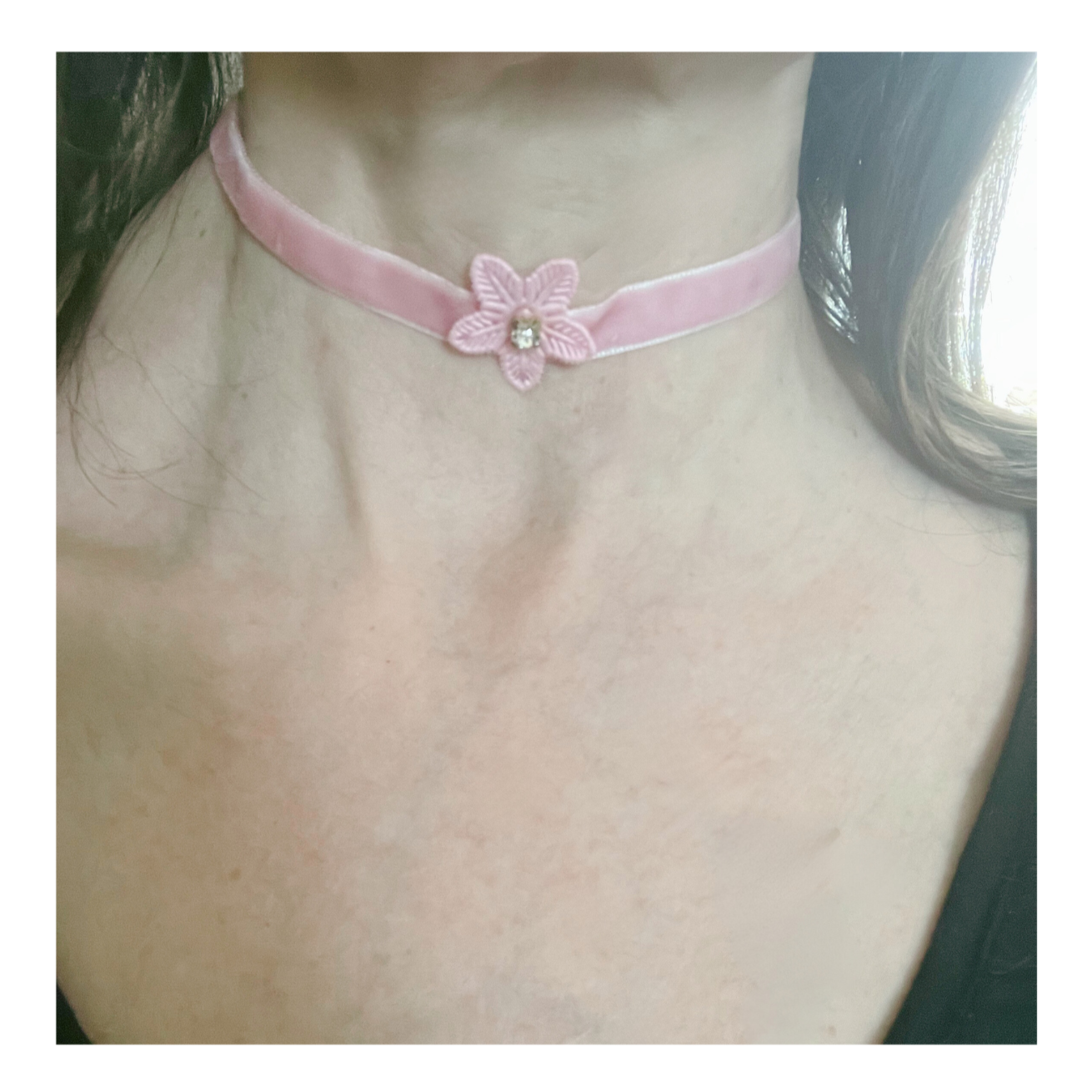 Pink velvet choker with flower.
