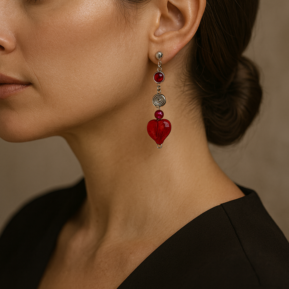 Red heart-shaped earring.