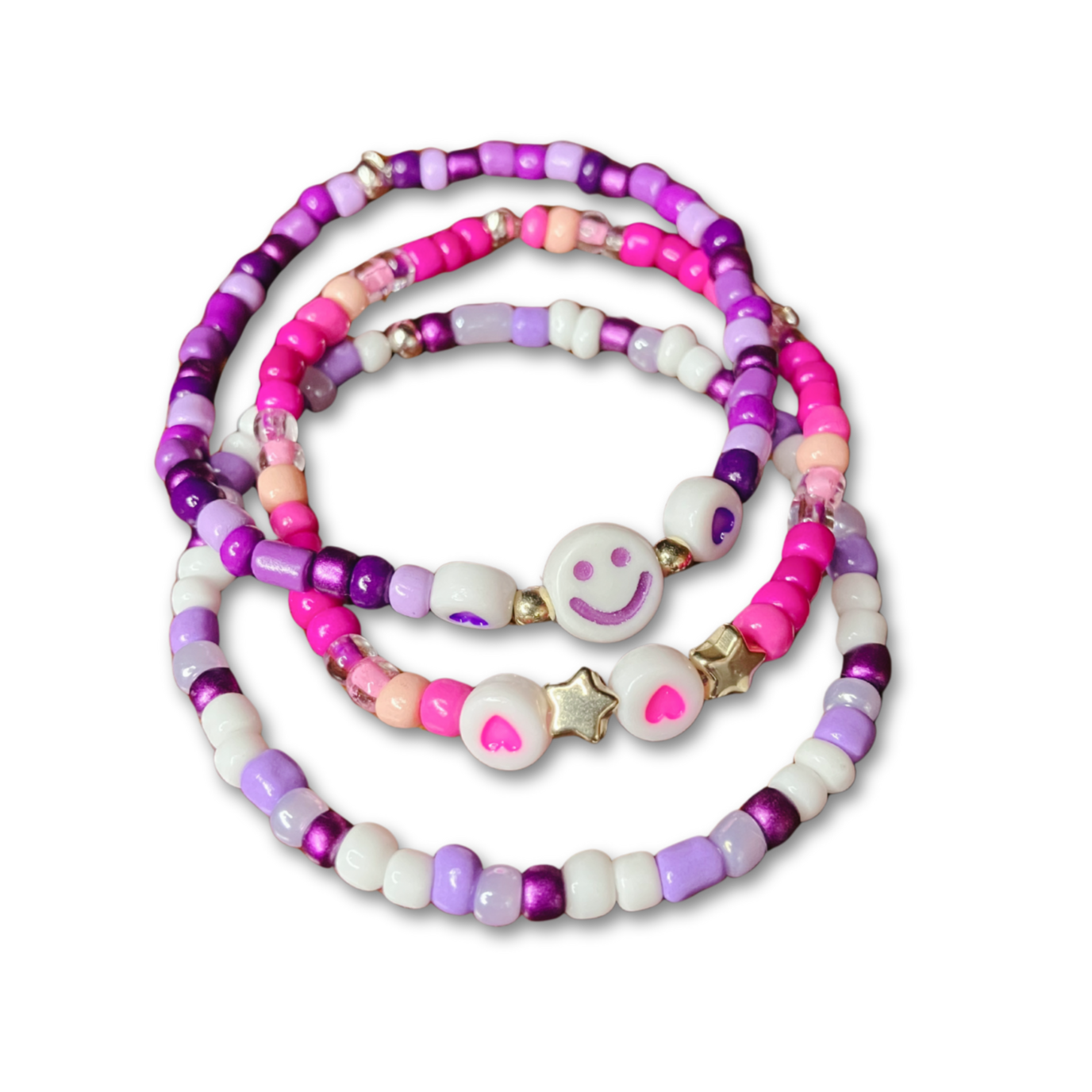 Three purple and pink beads bracelets.