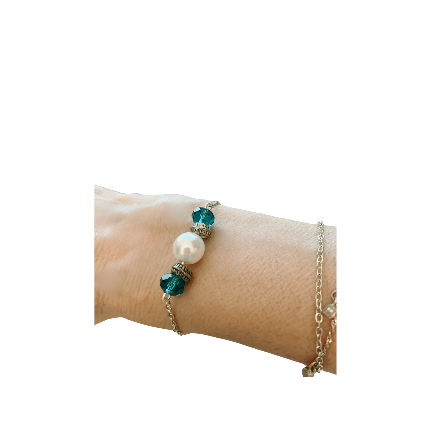 Silver chain bracelet with white pearl and blue glass beads.