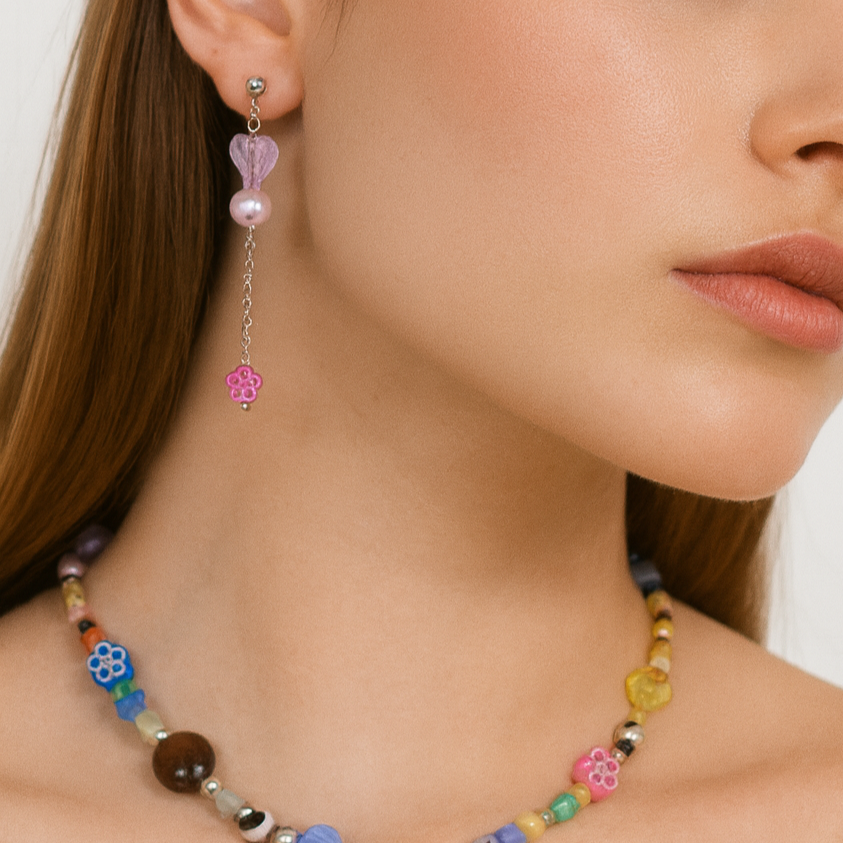 Dangling earrings with pink heart, silver chain with pink flowers.