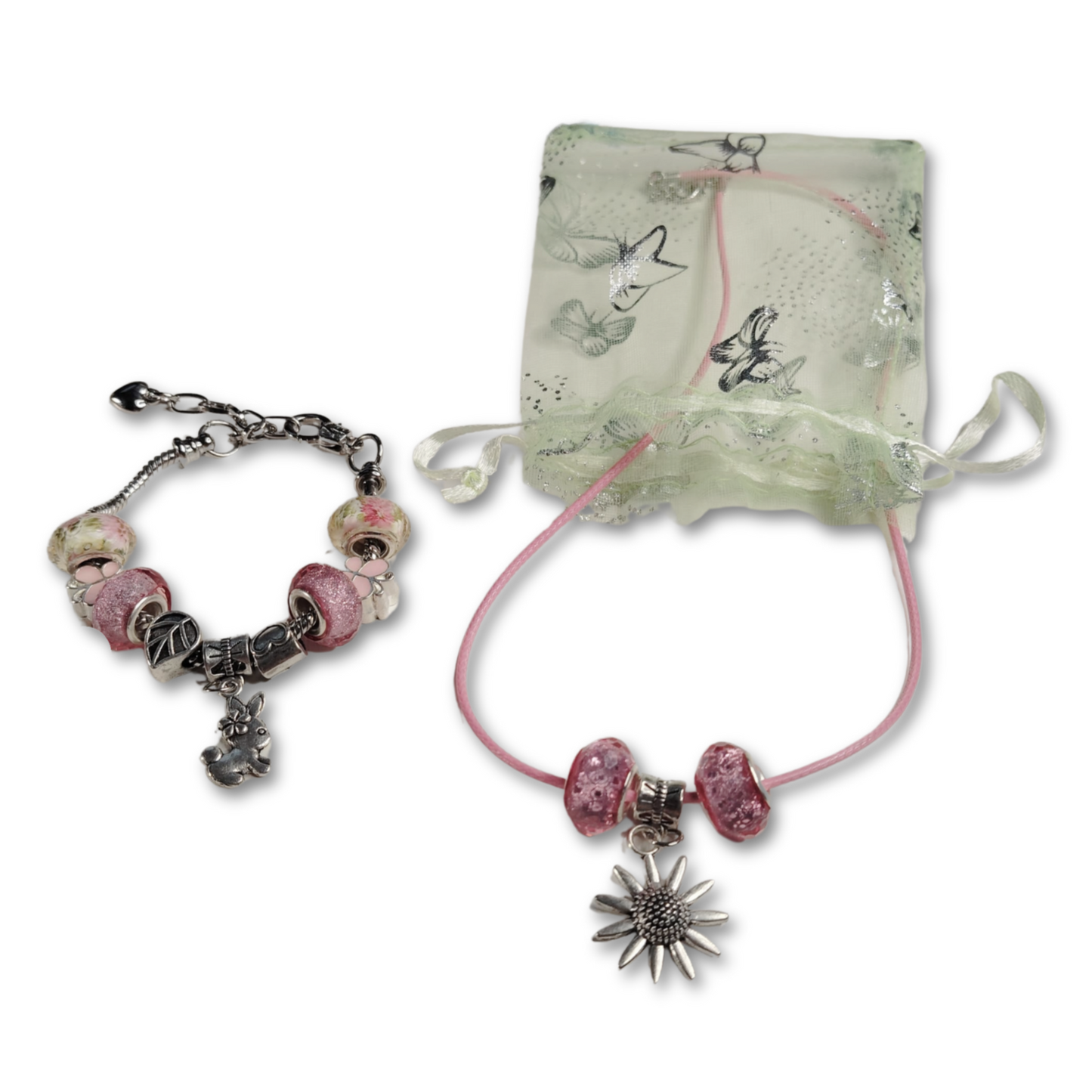Star necklace with pink beads and matching charm bracelet gifted in an organza bag