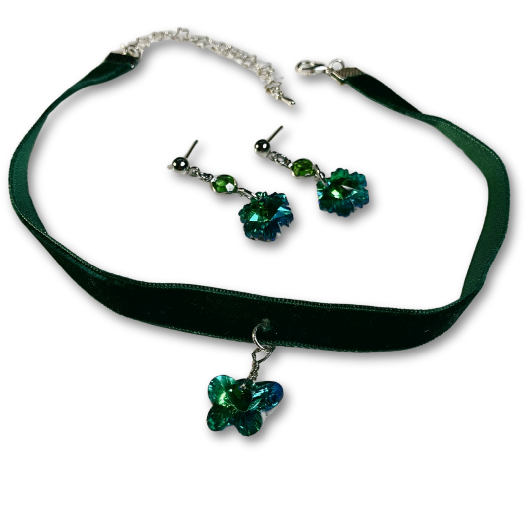 Dark green velvet choker with green glass butterfly and matching earrings.