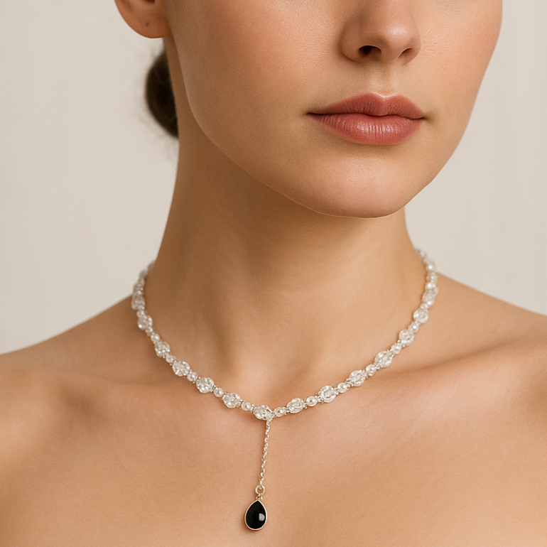 Necklace with white glass beads and teadrop pendant