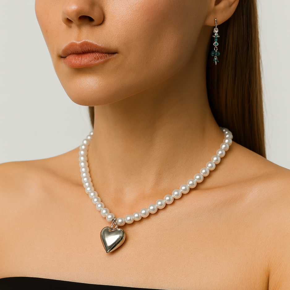 Pearl necklace with a heart pendant.