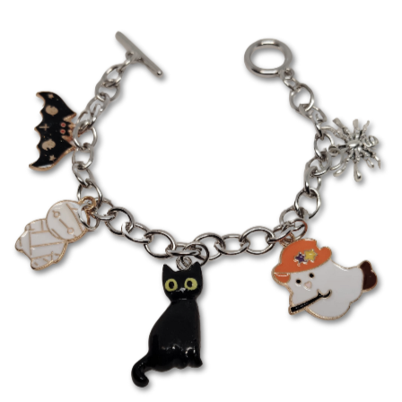 The Halloween Ghostly Glam bracelet adorned with pendants of a bat, ghosts and a cute cat