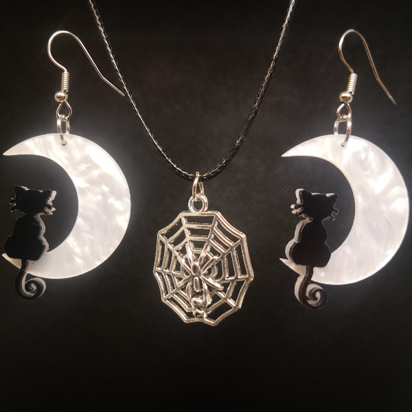 Moonlit cat earrings with sharp spider web necklace