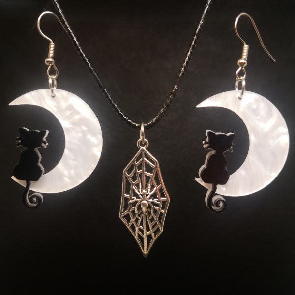 Moonlit cat earrings with slender spider web necklace