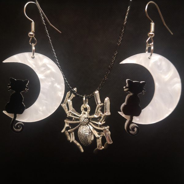 Moonlit cat earrings with tarantula necklace