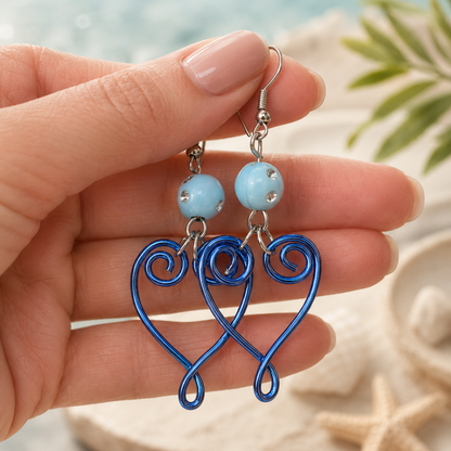 Blue wire heart earrings.