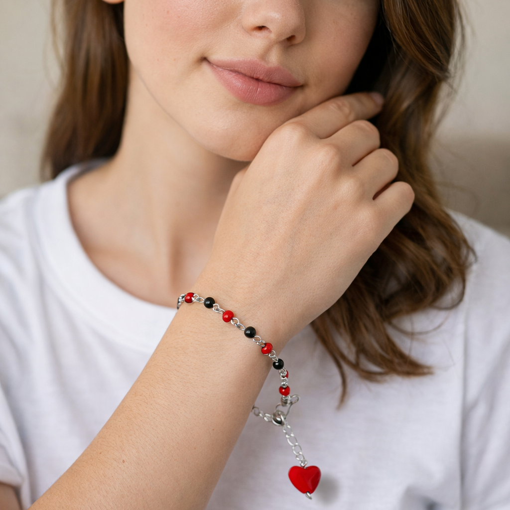bracelet with a red heart charm