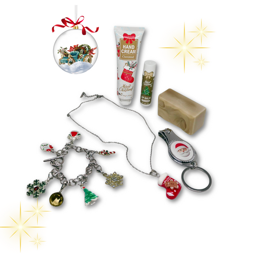 Collection of Christmas-themed items including a necklace, keychain/nail clipper/bottle opener, hand cream, lip balm, mini cinnamon soap.