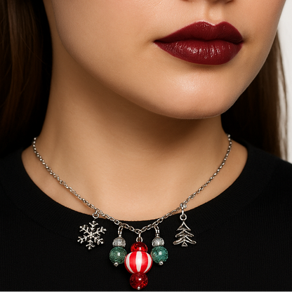 Silver necklace with Christmas-themed charms.