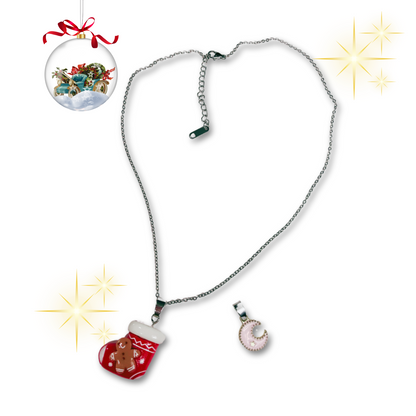 Silver necklace with red sock and gingerbread man and extra pendant.