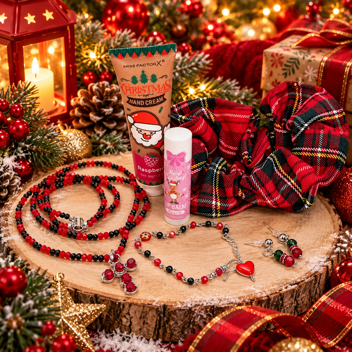 Christmas gift set with jewelry, hand cream, lip balm and hair scrunchie.