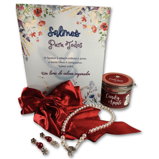 A Christmas gift of Candy Apple tea, pearl necklace with matching earrings, red satin hair bow and coloring book. Wrapped in a gift box. 
