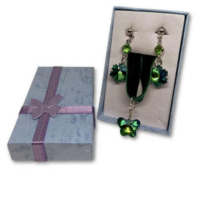 A Christmas gift of velvet choker and earrings. Blue gift box.