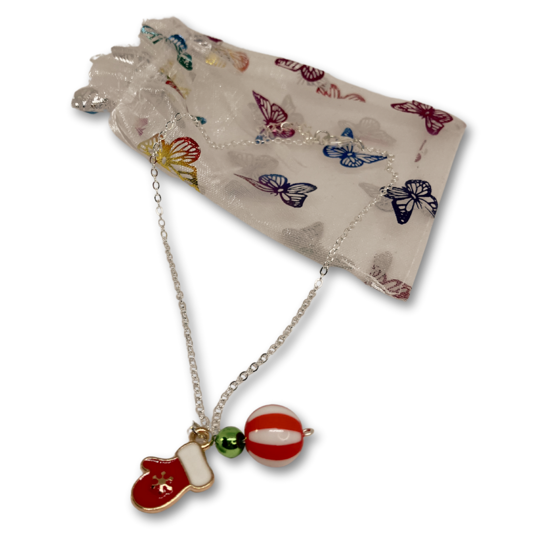 Christmas-themed necklace and butterfly bag.