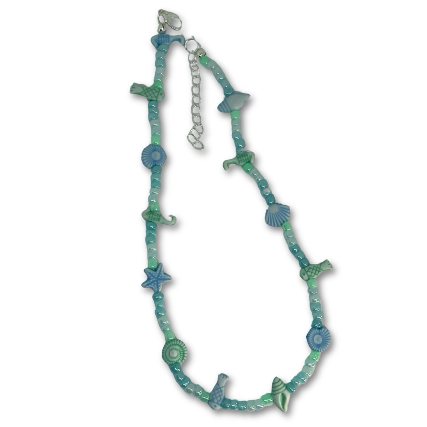 Beach themed necklace.
Colar com tema de praia.