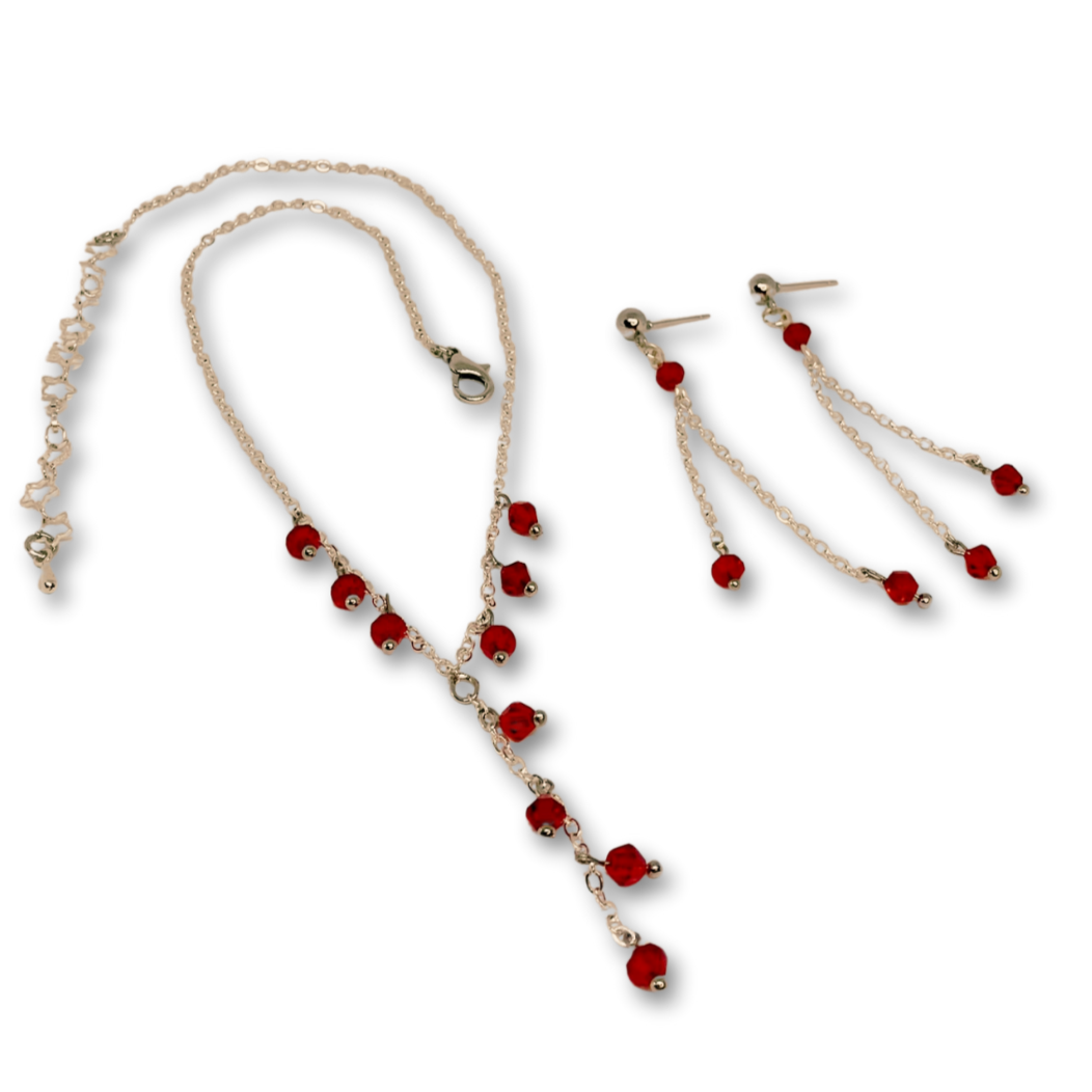 Silver necklace and red earrings. 
Colar e brincos a condizer.