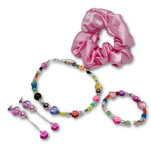This set includes: Satin Pink Hair Scrunchie, Multi color Beaded Necklace, matching Bracelet and Dangling matching Earrings.