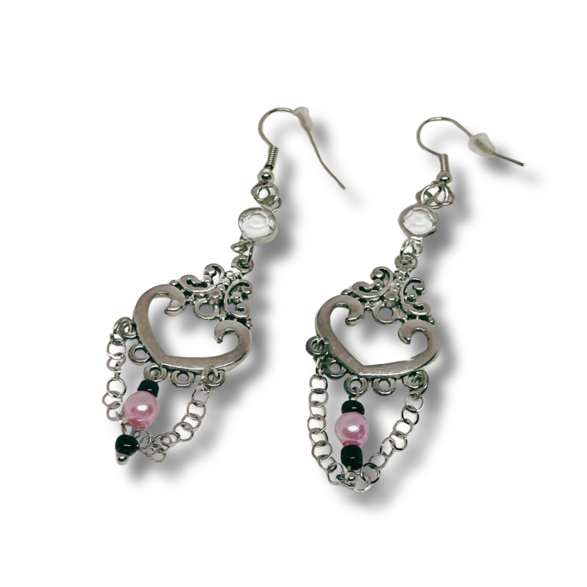 Silver dangling earrings with pink beads