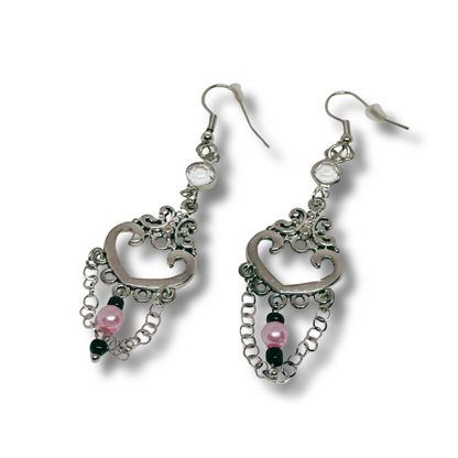 Silver dangling earrings with pink beads