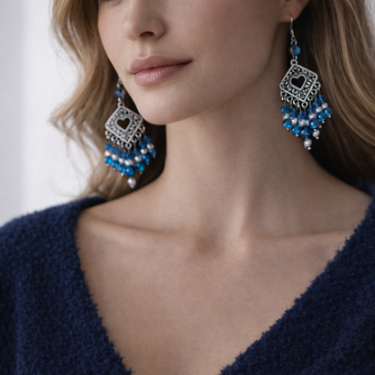 Dangling silver and blue earrings