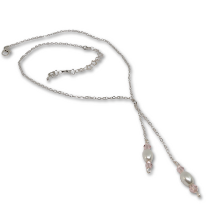 Silver necklace with imitation white pearls and pink glass beads.