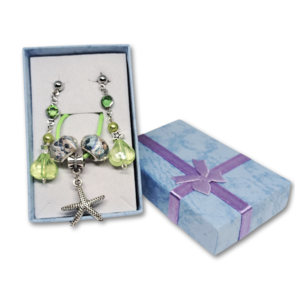 The Everyday Coastal Charm gift set for women featuring green ocean themed necklace with starfish charm and earrings within a gift box