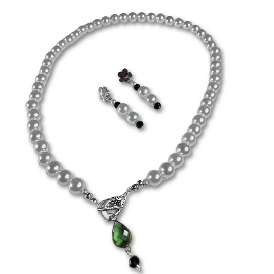 The Everyday Elegant Pearl Gift Set for women featuring white pearls necklace with green stone pendant and matching pearl earrings. 