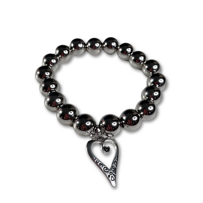 Silver pearls bracelet with heart.