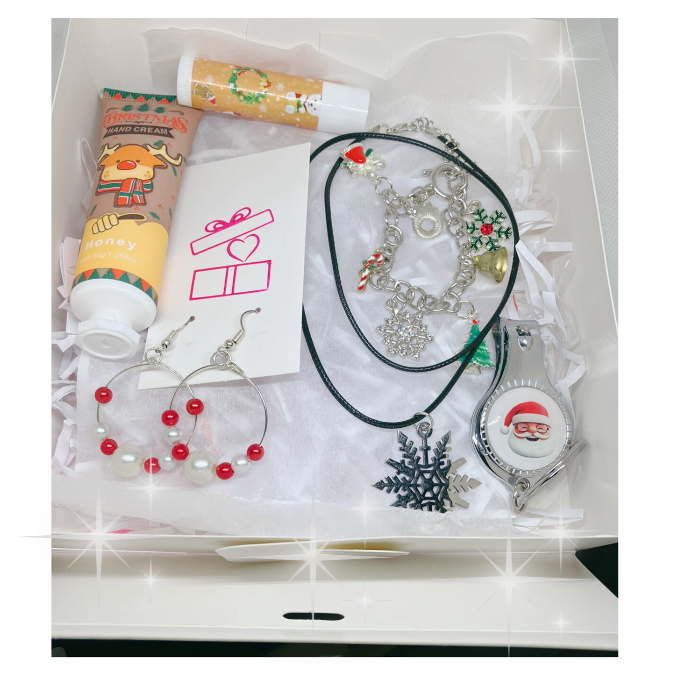 Gift box with honey hand cream, honey lip balm, earrings, necklace, bracelet and nail clipper/bottle opener.