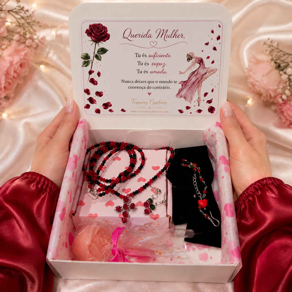 Set of jewelry including a necklace, earrings, bracelet and black velvet hair bow inside gift box.