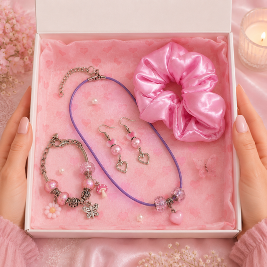Gift set with bracelet, earrings, and scrunchie in a white gift box.