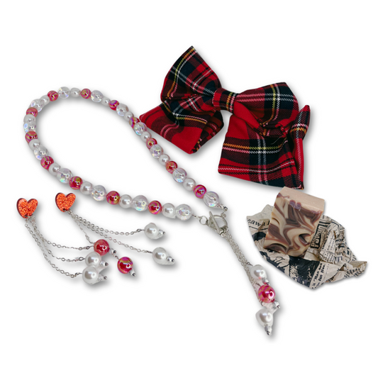 Set includes: Plaid red clip on hair bow, glass beads necklace with matching dangling earrings and cinnamon and cocoa soap. Gift box. 